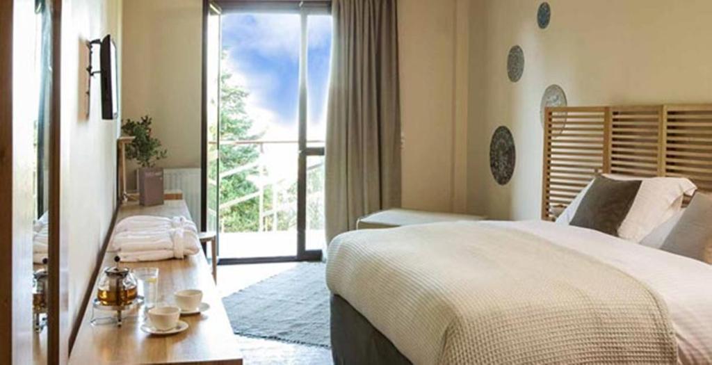 Natura Hotel Vitina Habitación foto